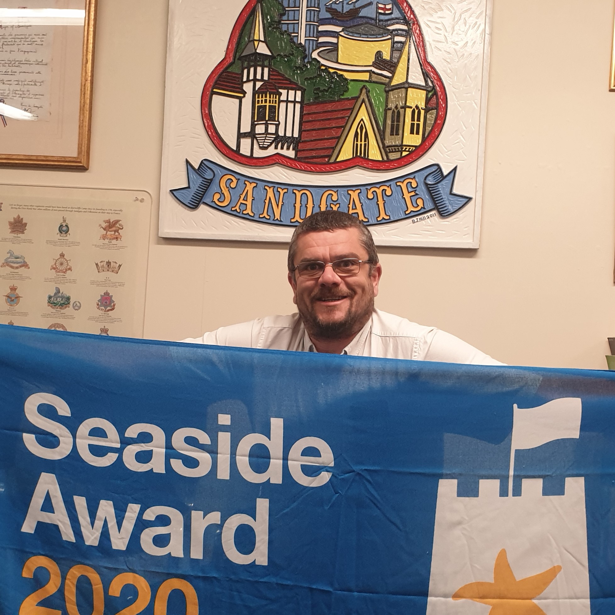 Tim Prater with SeasideAward flag